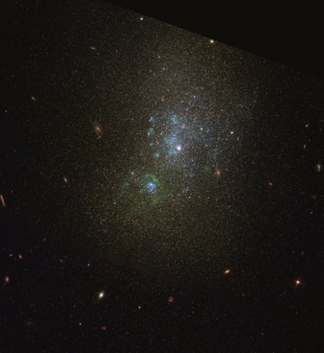 NGC 5238 from Hubble. North is up. There's no data in the upper right corner. Blurry diagonal line is the abysmal chip gap.<br />Red: ACS / WFC F814W<br />Green: ACS / WFC F606W<br />Blue: WFC3 / UVIS F275W + F336W + F438W